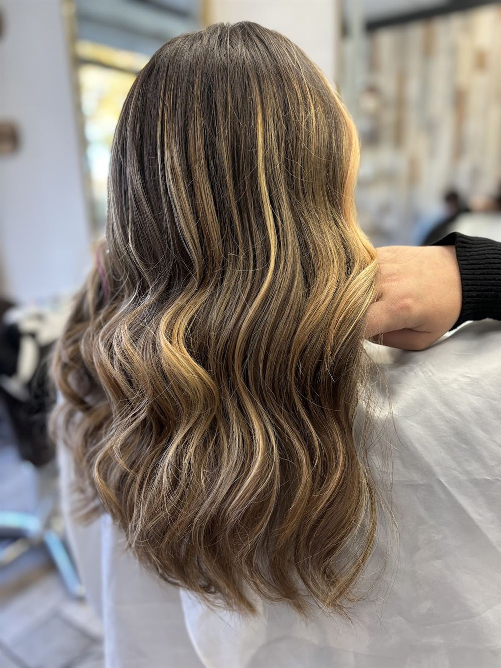 Balayage miel sur longueurs ondulées